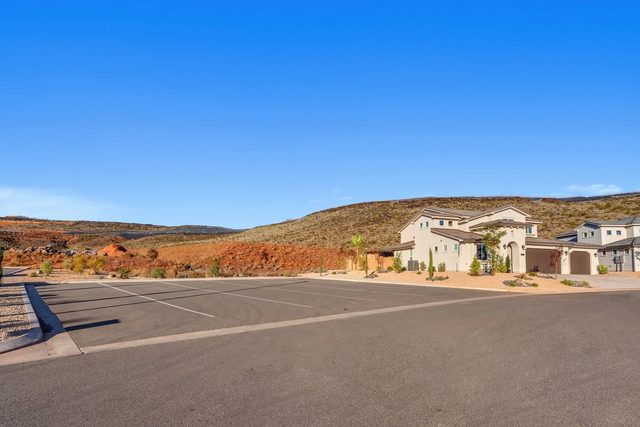 Street view of Paseos 1496 and neighboring hillside