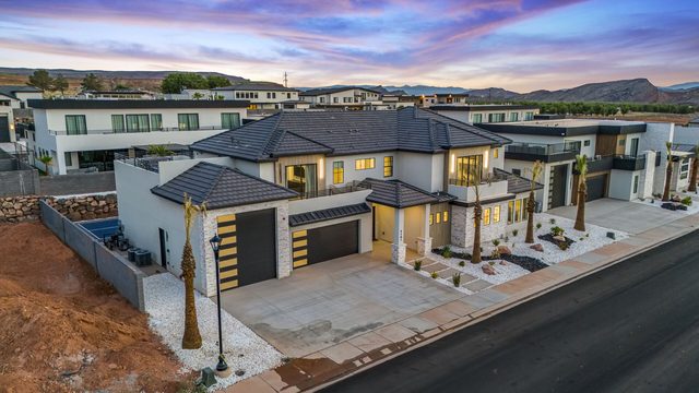 Aerial front view of Pecan Valley 5161 at sunset
