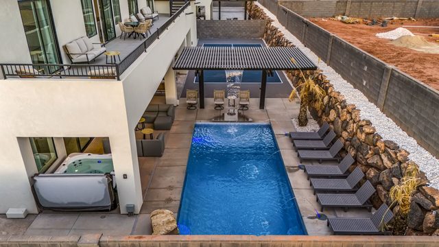 Aerial view of the private pool, hot tub and loungers at Pecan Valley 5173