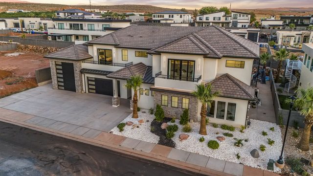 Aerial of front exterior and landscaped yard of Pecan Valley 5193