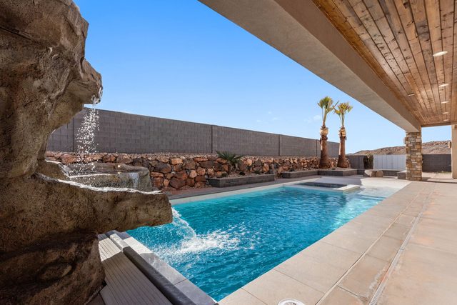 5205 private pool with rock waterfall feature