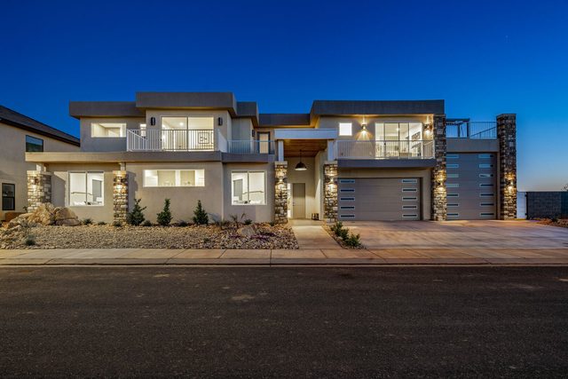 Front of Pecan Valley 5205 lit up at twilight
