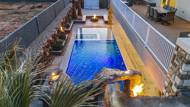 Overhead view of the private pool, fire features and side patio