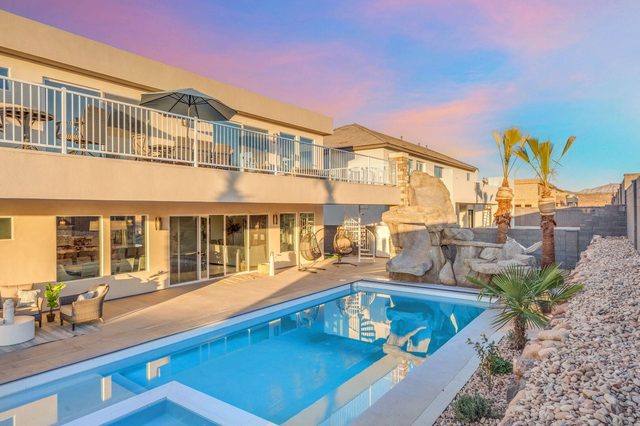 Private pool and upper balcony of Pecan Valley 5205 at sunset