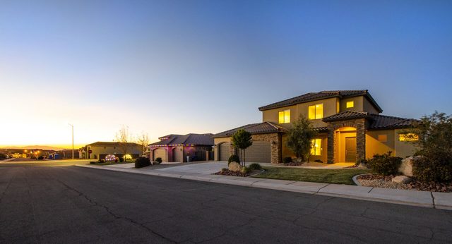 Front exterior of Sand Hollow 3370 at twilight from the street