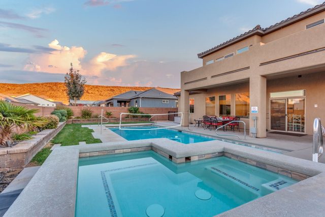 Private pool and raised hot tub at sunset at Sand Hollow 3370