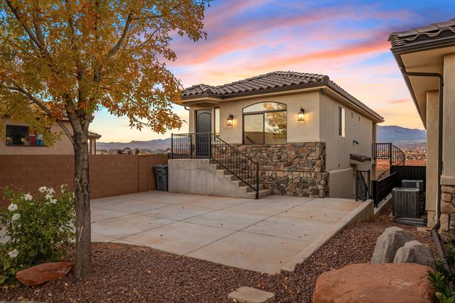 Two-story casita next door to the main home at sunset