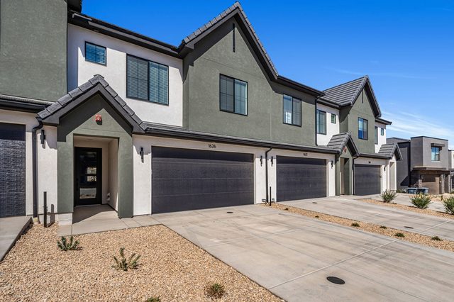 Front exterior and garages of the Skyline Retreat townhomes