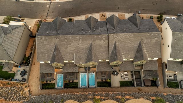 Overhead view of the three homes' backyards and swim spas