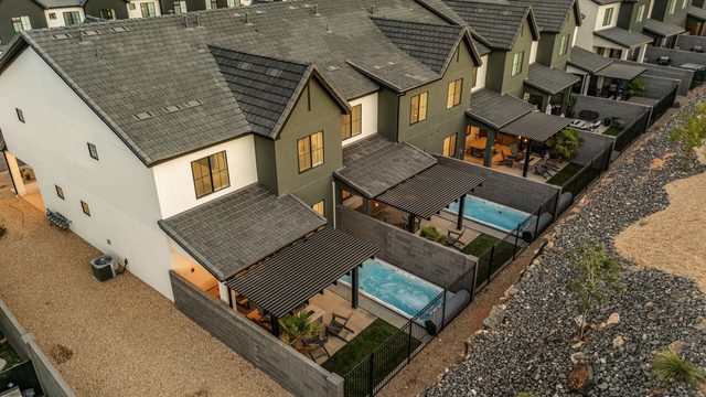 Aerial of the townhome backyards with private swim spas