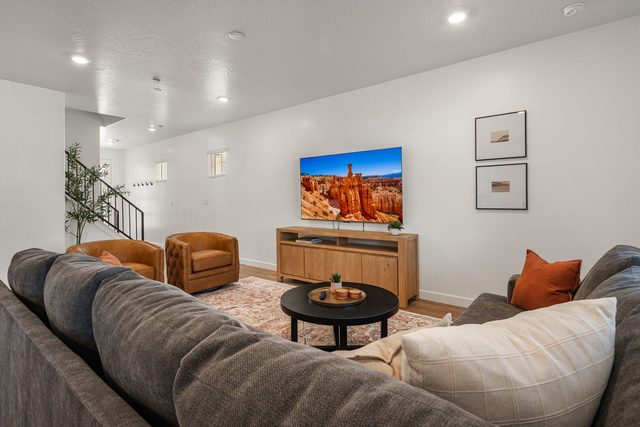 Living room sectional facing the TV wall at Skyline 1634
