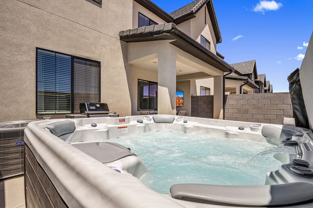 Private hot tub beside the back patio at Skyline 1649