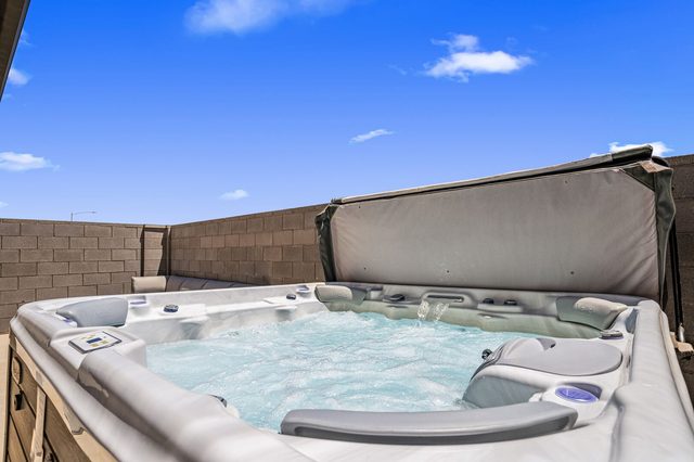 Private hot tub in the walled backyard at Skyline 1649