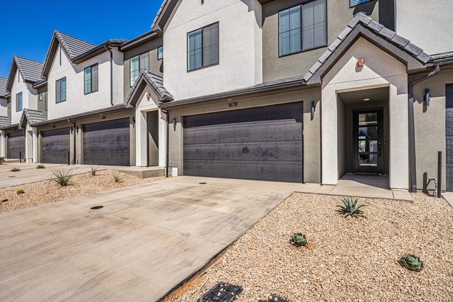 Front exterior and garage of Skyline 1678 townhome