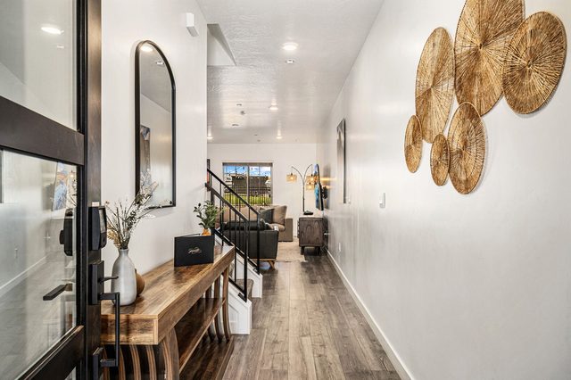 Entry hallway with console table leading to the living area