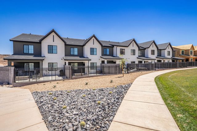 Row of two-story Skyline Resort townhomes with landscaped walkway
