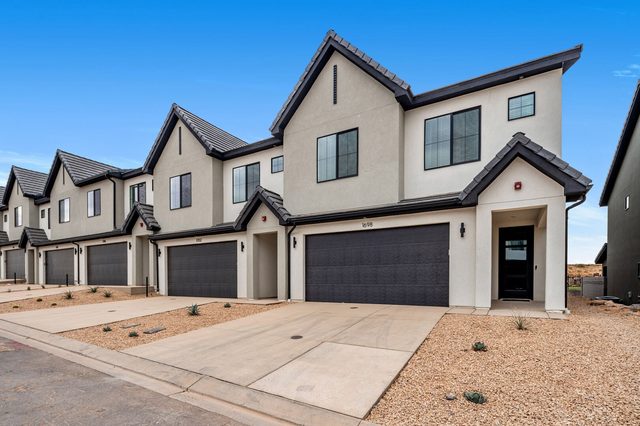 Front exterior of the two-story Skyline 1698 townhome with garage