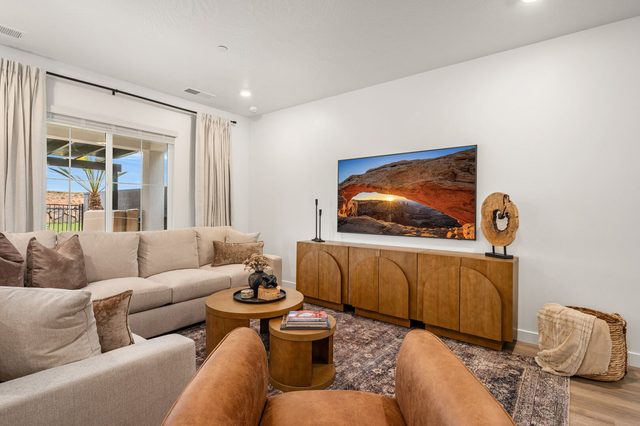 Sectional seating and swivel chair facing the living room TV