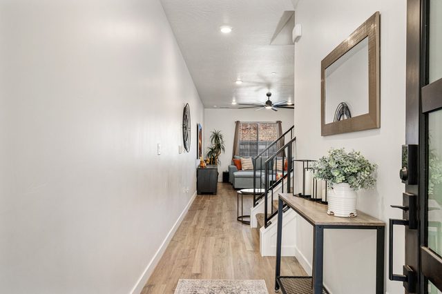 Front entry hallway leading to the living room at Skyline 1729