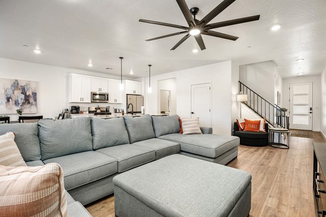 Open living area looking toward the kitchen and entry at Skyline 1729