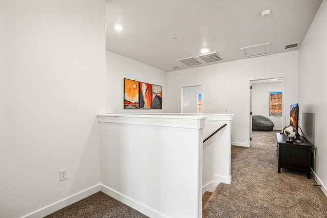 Upstairs landing leading to the loft and bedrooms at Skyline 1729