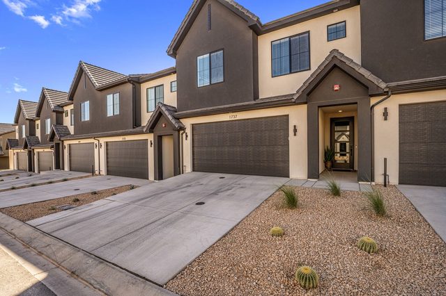 Front exterior of Skyline 1737 townhome with garage and driveway