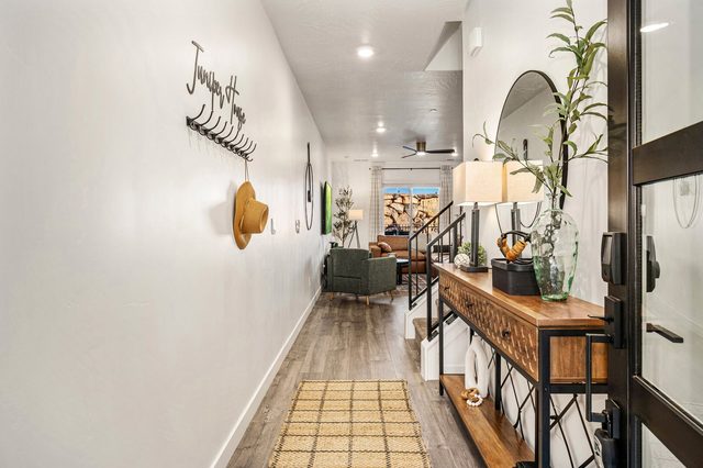 Entry hallway with console table leading to the living area