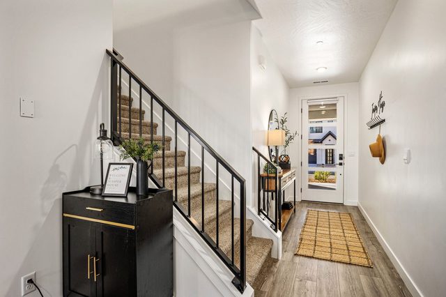 Front entry and staircase inside Skyline 1738