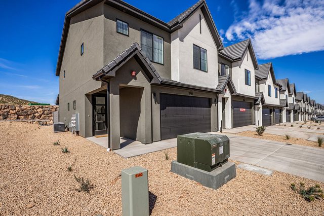 Skyline 1742 corner-lot townhome exterior with garage