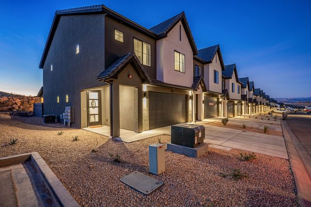 Skyline 1742 and neighboring townhomes at dusk