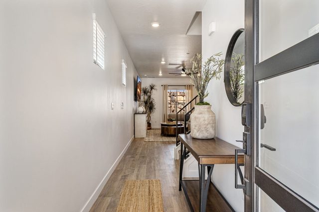 Entry hallway with console table leading to the living room
