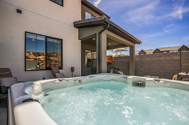 Private hot tub beside the covered patio at Skyline 1742