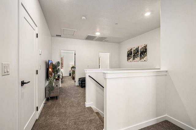Upstairs hallway landing leading to the loft and bedrooms