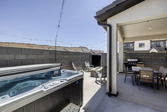 Private hot tub on the fenced back patio at Skyline 1757