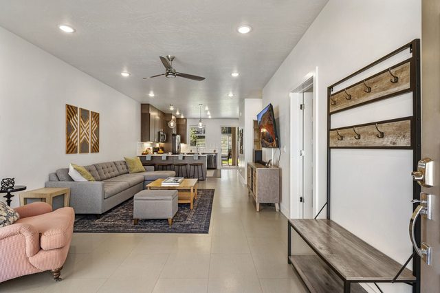 Entry bench and hall tree opening to the open living area