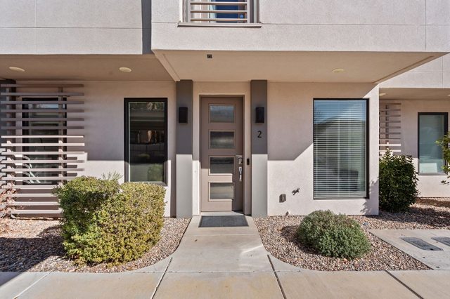 Front entry door and desert landscaping at The Lofts 2