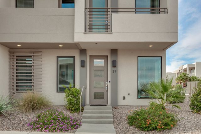 Front entry and steps of The Lofts 37 townhome
