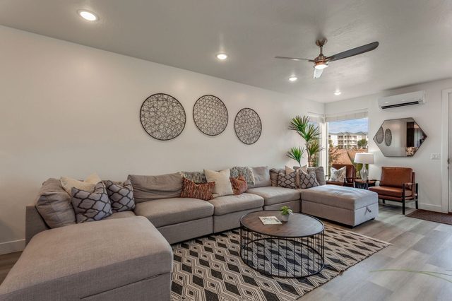 Large sectional sofa with round coffee table in the living room
