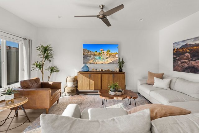 Living room sectional facing a media console and TV