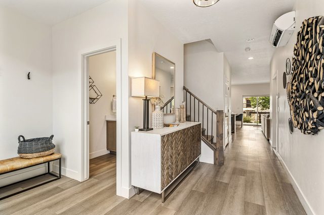 Entry hallway with console table leading to the living area