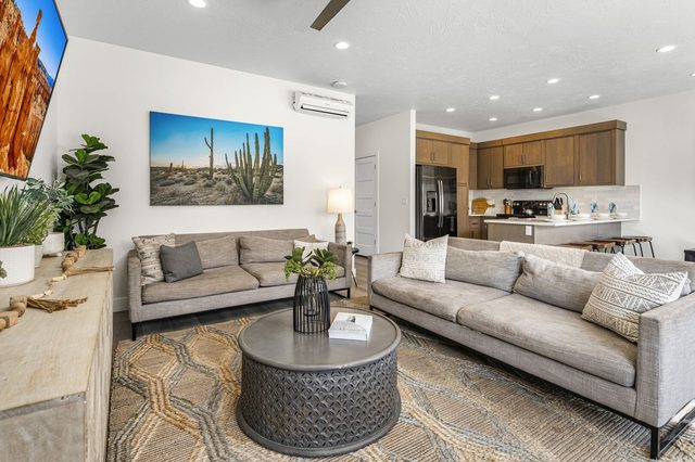 Great room sofas facing the kitchen
