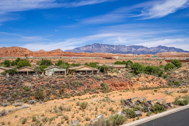 Red rock hills and distant mountains near the Town Center community