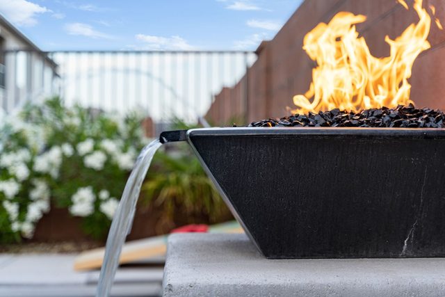 Fire bowl spilling water into the private pool at Zion Village 2053
