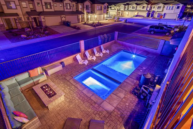 Overhead night view of the private pool and patio