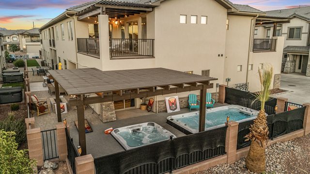 Aerial view of the backyard pergola, hot tub and swim spa