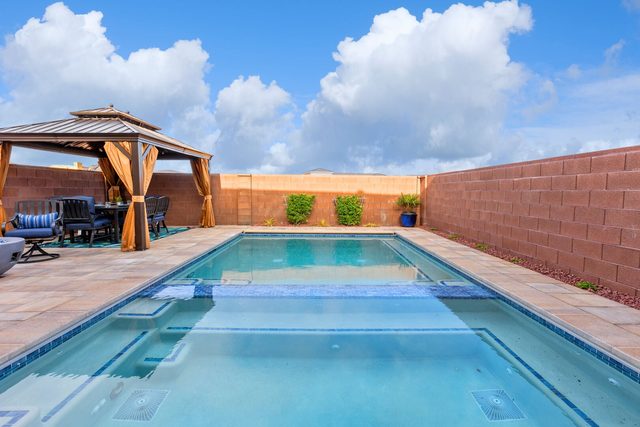 Private pool with built-in hot tub and gazebo