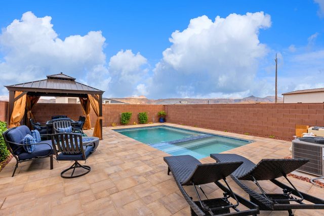 Private pool and spa with loungers and gazebo