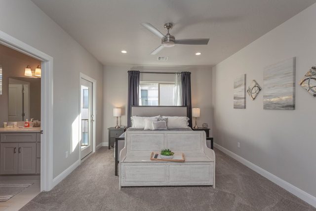 King master suite with ensuite bathroom and balcony door
