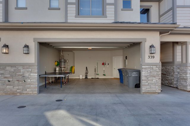 Open garage with ping pong table at Zion Village 339