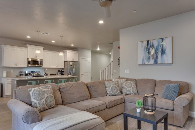 Living room sectional sofa open to the kitchen